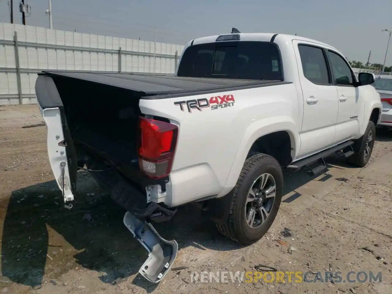 4 Photograph of a damaged car 3TMCZ5AN4KM236077 TOYOTA TACOMA 2019