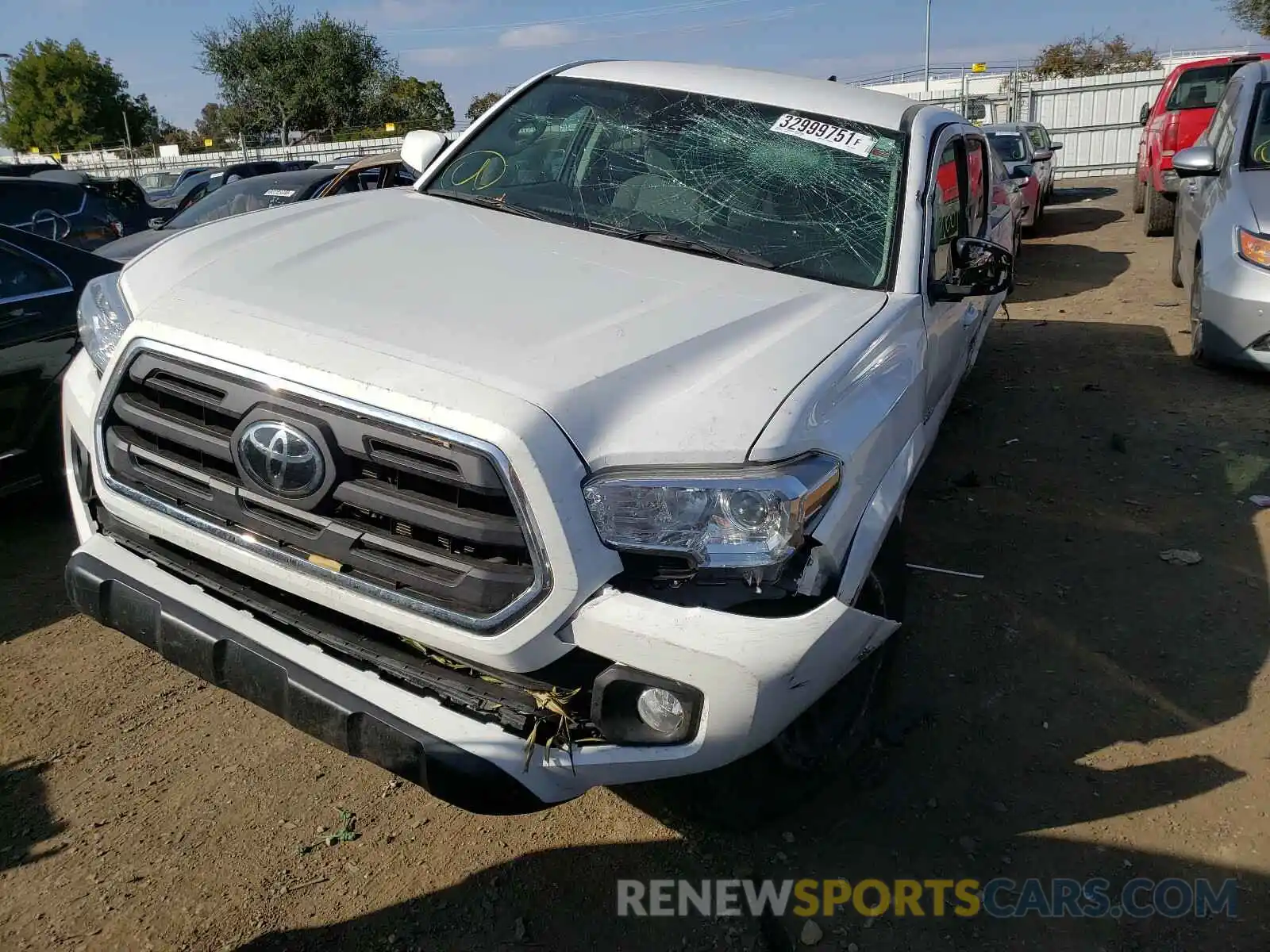 2 Photograph of a damaged car 3TMCZ5AN4KM236404 TOYOTA TACOMA 2019