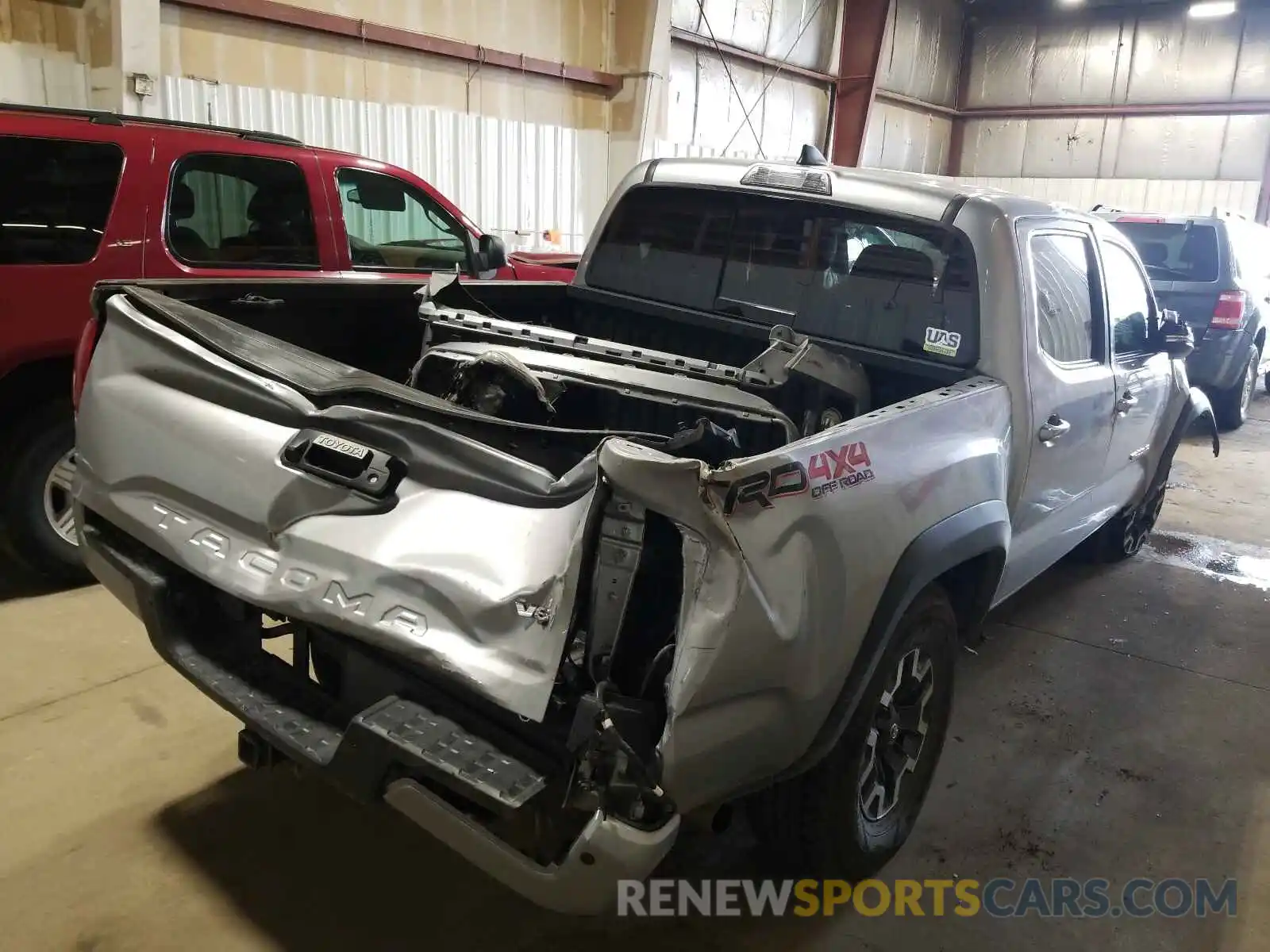 4 Photograph of a damaged car 3TMCZ5AN4KM239612 TOYOTA TACOMA 2019