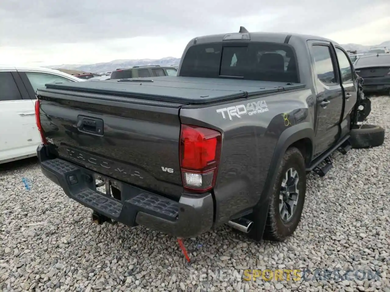 4 Photograph of a damaged car 3TMCZ5AN4KM239786 TOYOTA TACOMA 2019