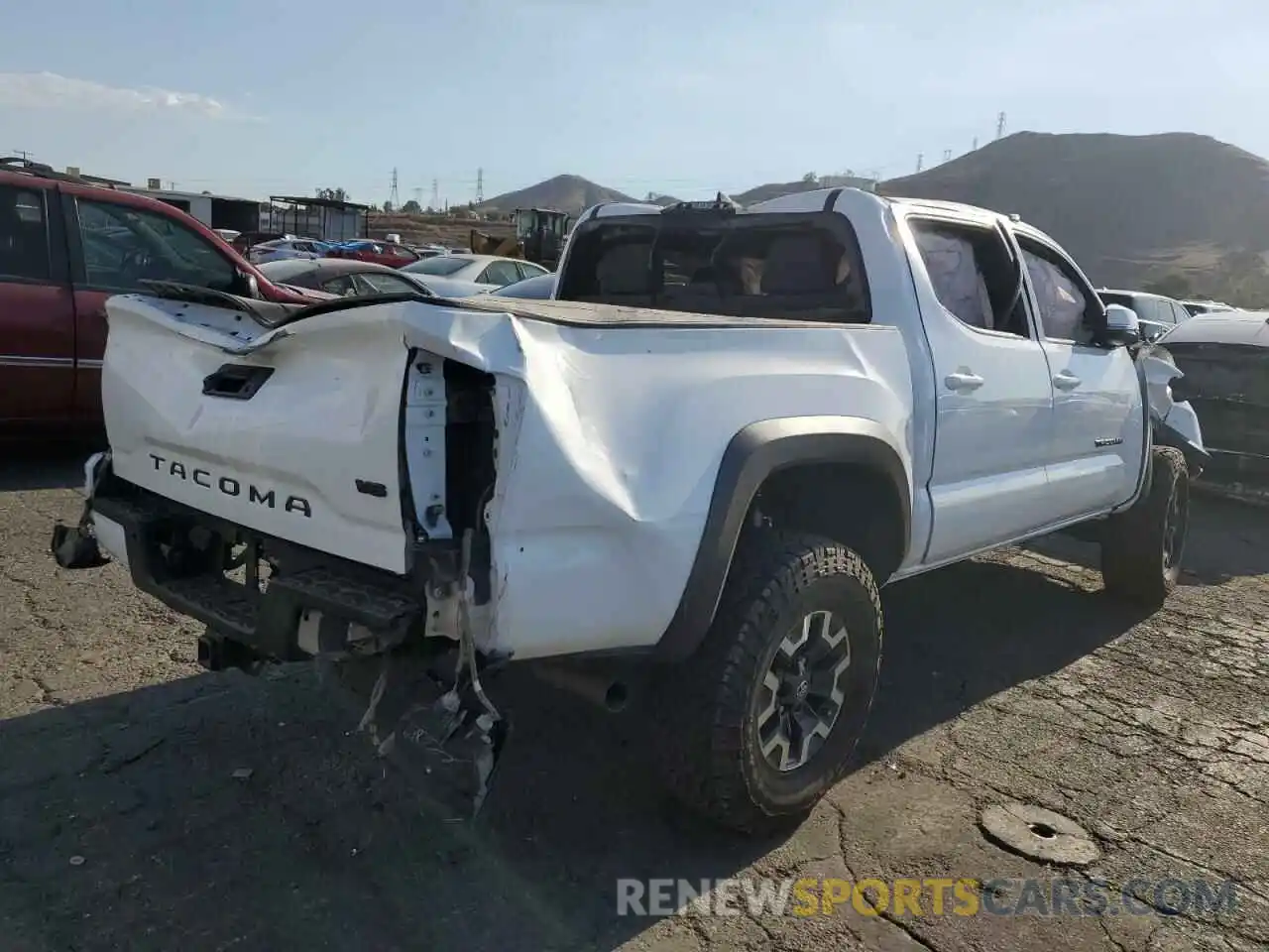 4 Photograph of a damaged car 3TMCZ5AN4KM243109 TOYOTA TACOMA 2019