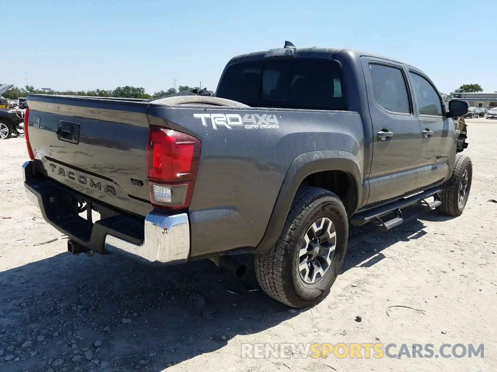 4 Photograph of a damaged car 3TMCZ5AN4KM243918 TOYOTA TACOMA 2019