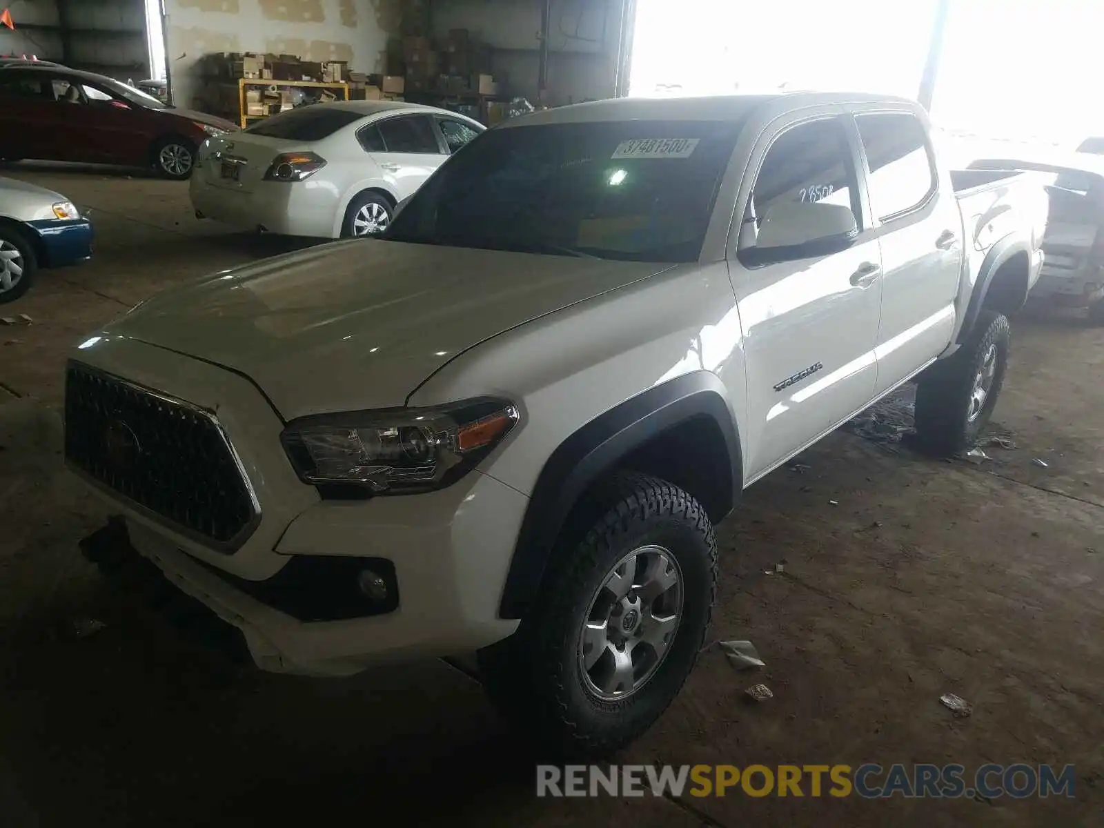 2 Photograph of a damaged car 3TMCZ5AN4KM245183 TOYOTA TACOMA 2019