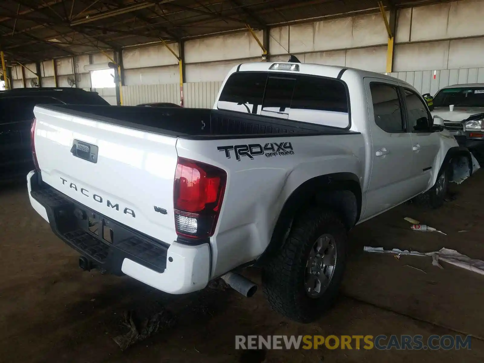 4 Photograph of a damaged car 3TMCZ5AN4KM245183 TOYOTA TACOMA 2019