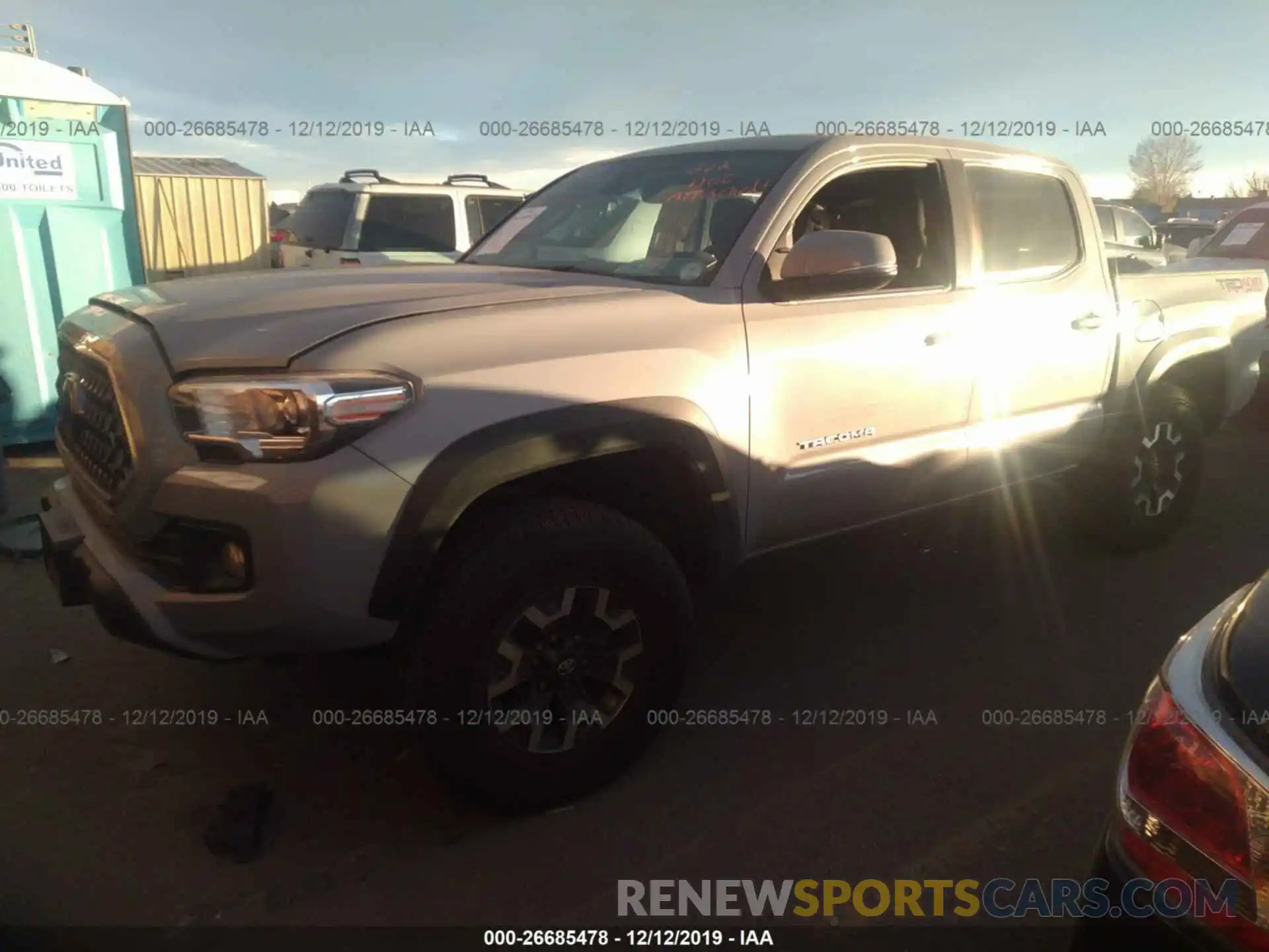 2 Photograph of a damaged car 3TMCZ5AN4KM246656 TOYOTA TACOMA 2019