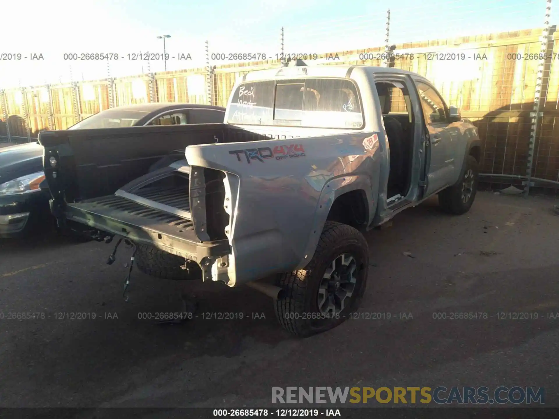 4 Photograph of a damaged car 3TMCZ5AN4KM246656 TOYOTA TACOMA 2019