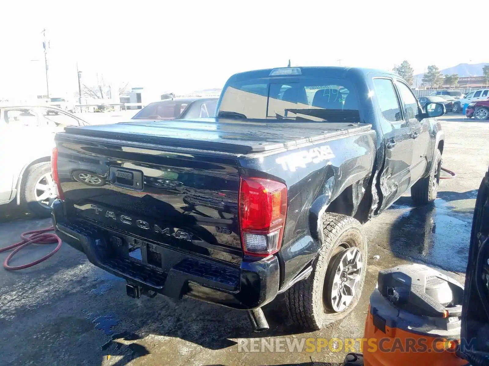 4 Photograph of a damaged car 3TMCZ5AN4KM246687 TOYOTA TACOMA 2019