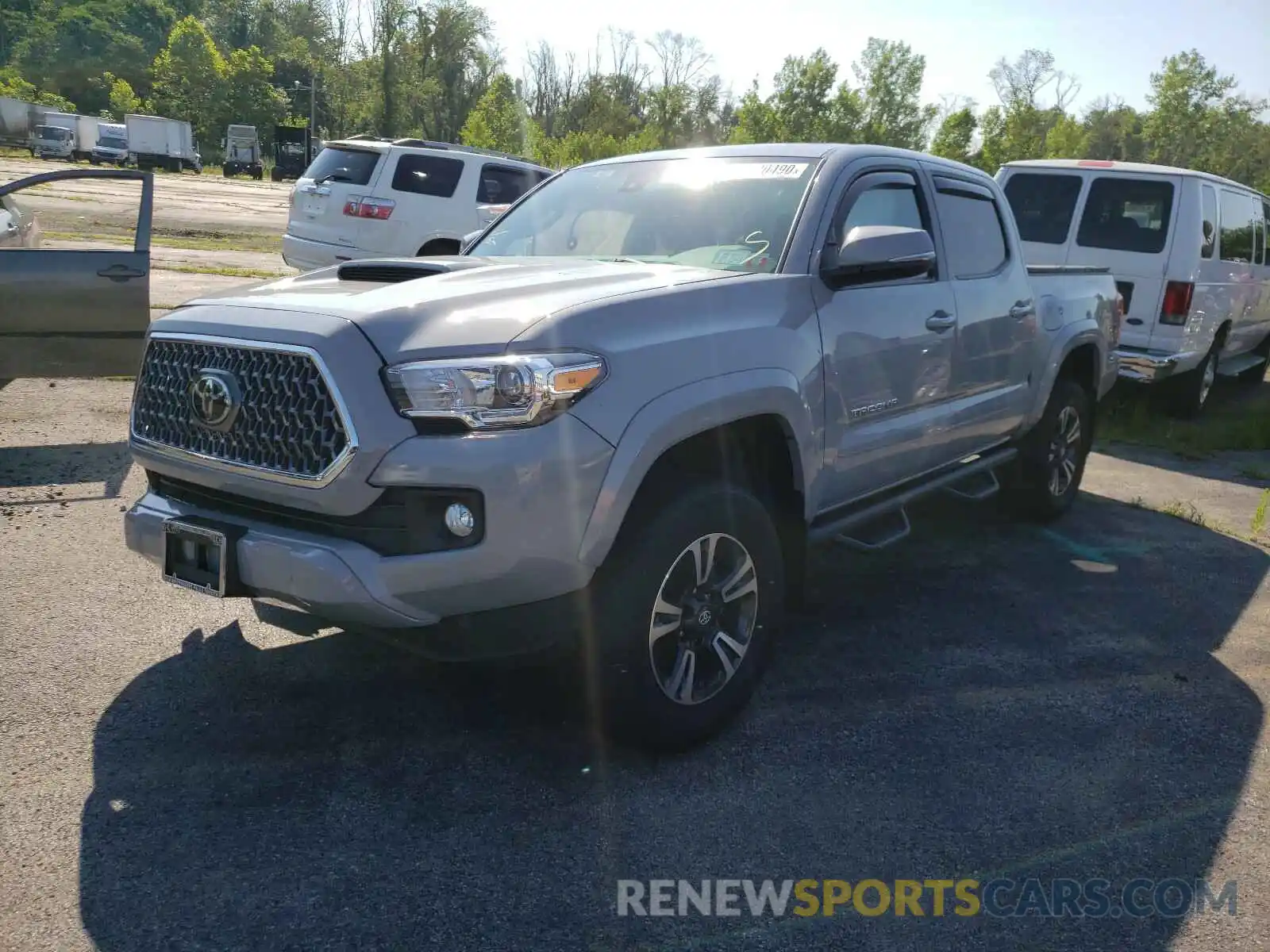 2 Photograph of a damaged car 3TMCZ5AN4KM249007 TOYOTA TACOMA 2019