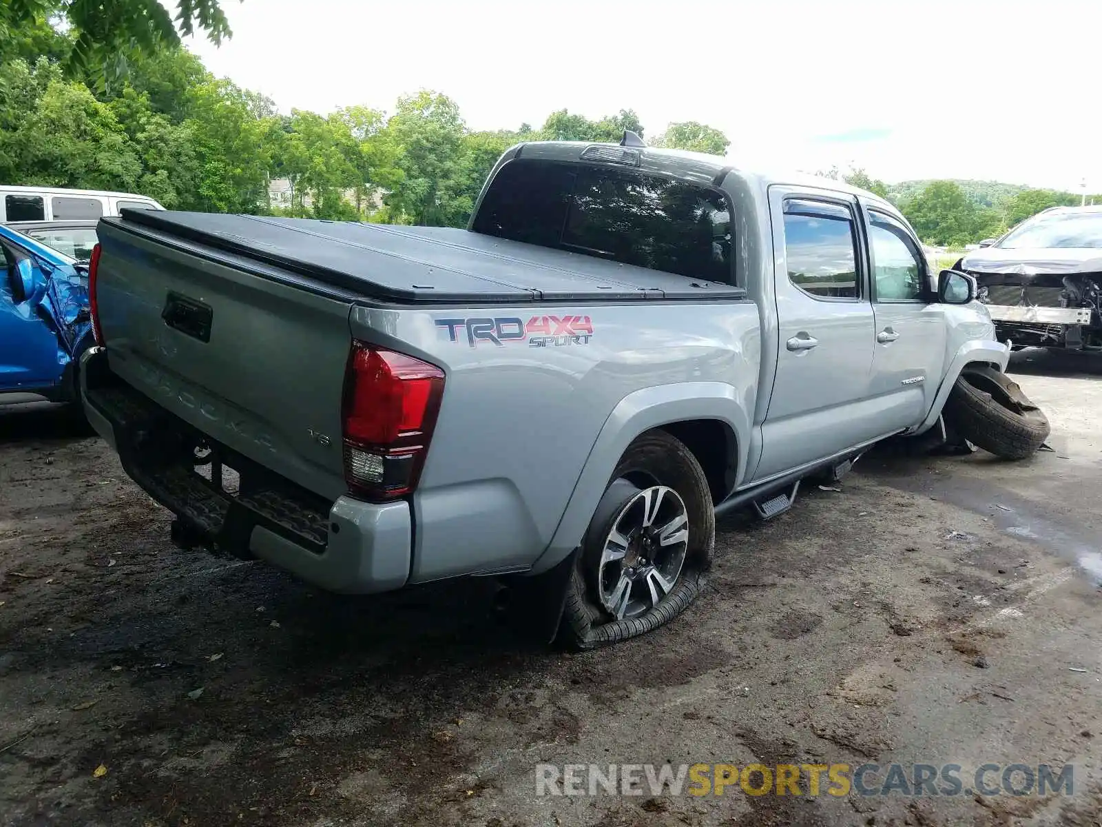 4 Photograph of a damaged car 3TMCZ5AN4KM249007 TOYOTA TACOMA 2019