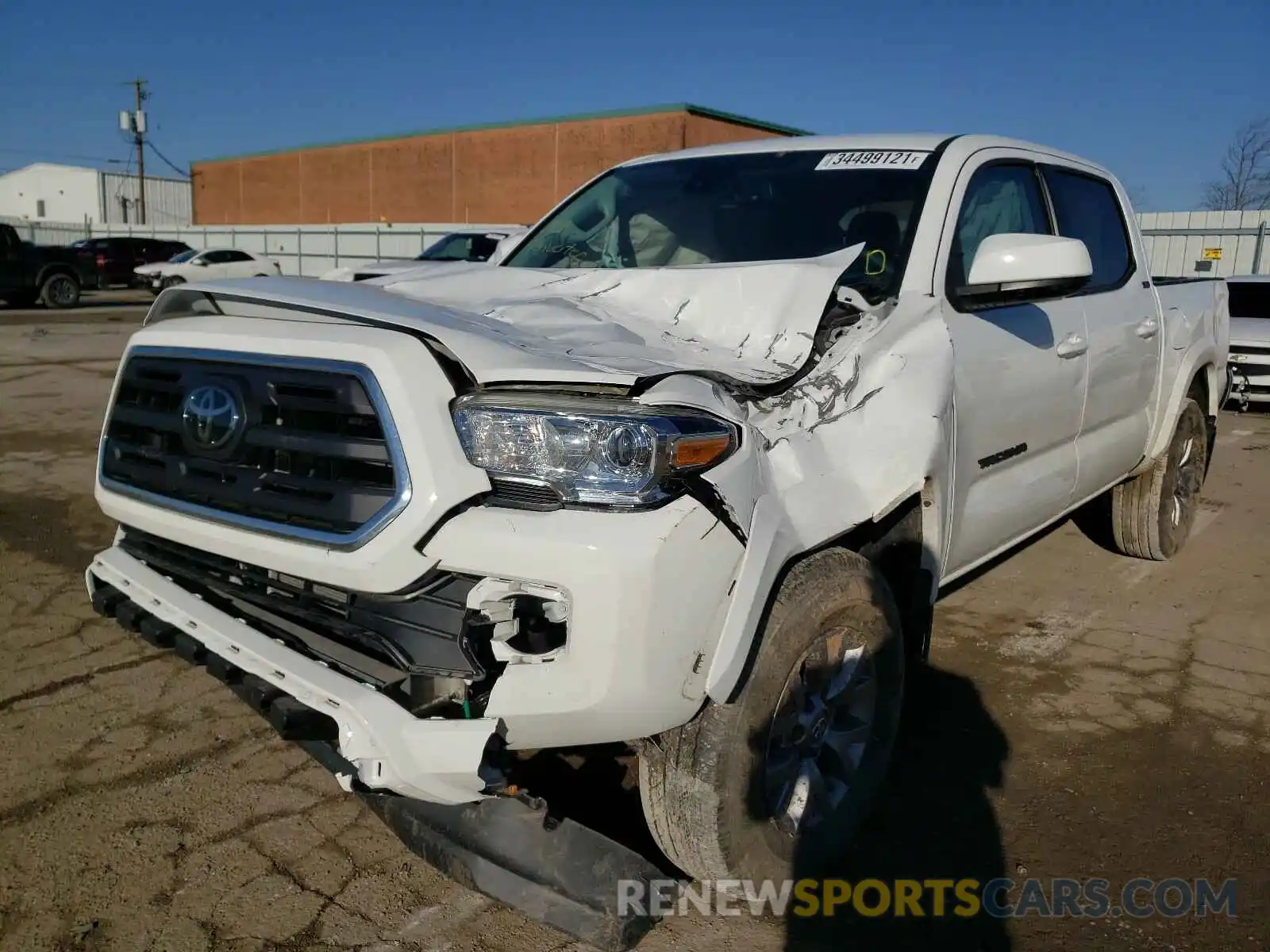 2 Photograph of a damaged car 3TMCZ5AN4KM249718 TOYOTA TACOMA 2019