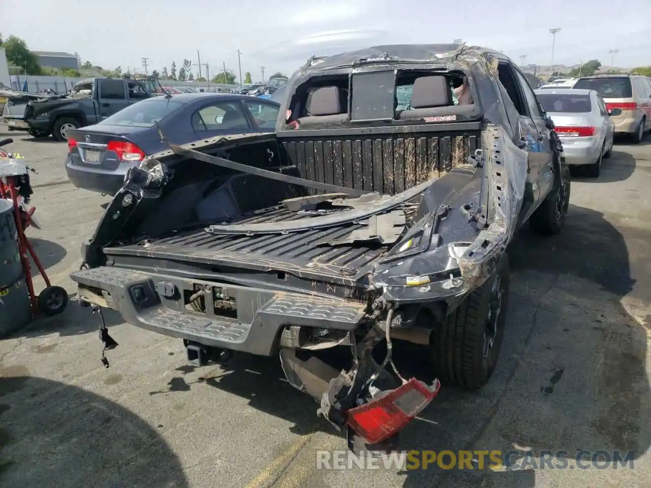 4 Photograph of a damaged car 3TMCZ5AN4KM251579 TOYOTA TACOMA 2019