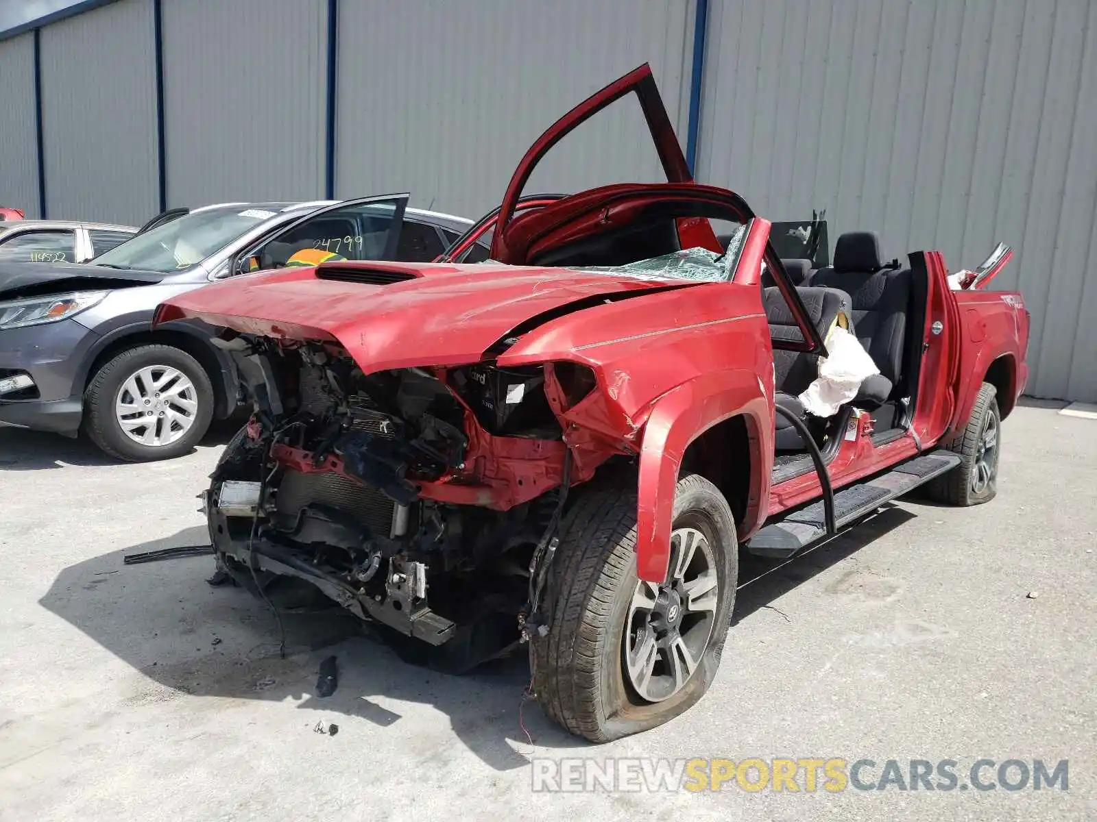 2 Photograph of a damaged car 3TMCZ5AN4KM255289 TOYOTA TACOMA 2019