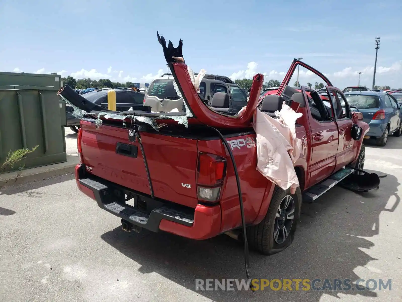 4 Photograph of a damaged car 3TMCZ5AN4KM255289 TOYOTA TACOMA 2019