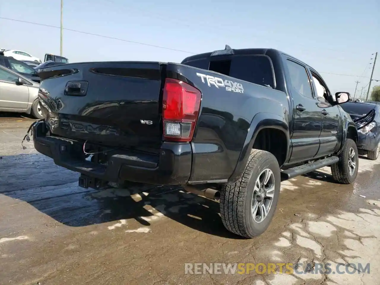 4 Photograph of a damaged car 3TMCZ5AN4KM261111 TOYOTA TACOMA 2019