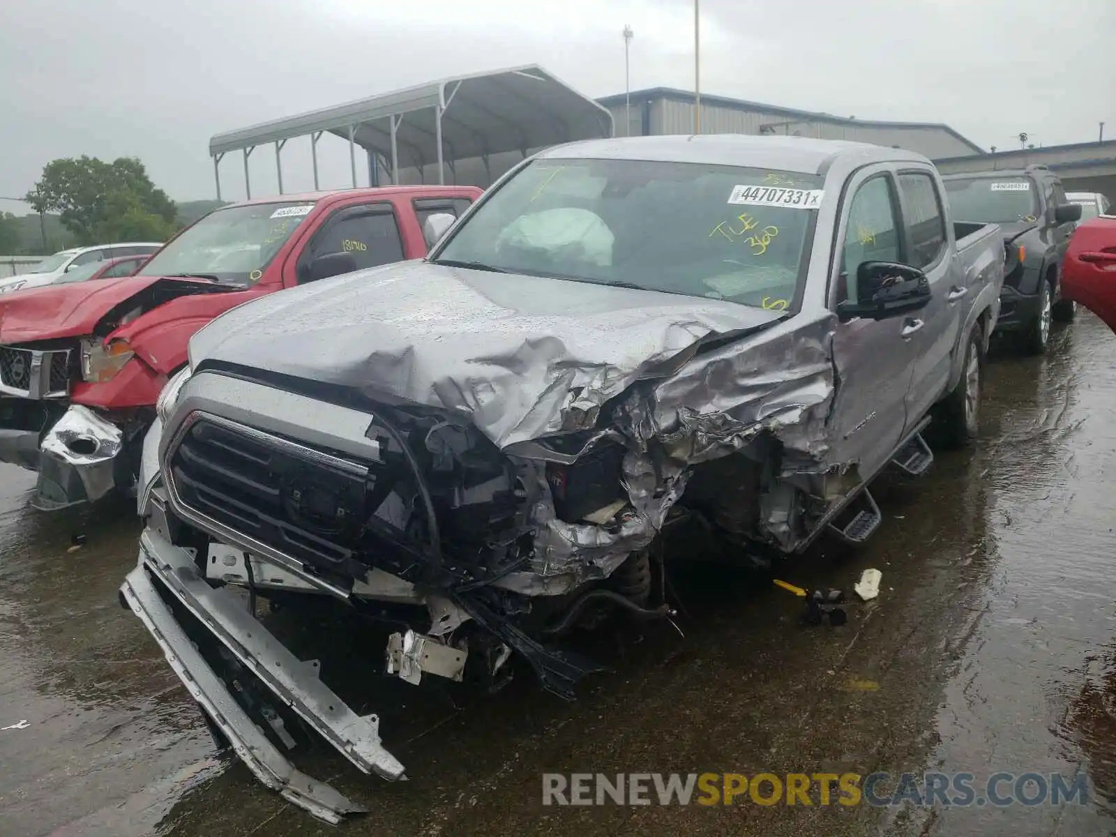 2 Photograph of a damaged car 3TMCZ5AN4KM261383 TOYOTA TACOMA 2019