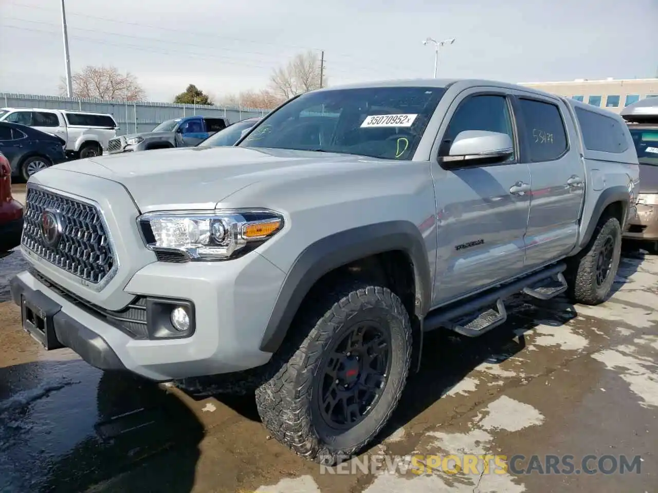 2 Photograph of a damaged car 3TMCZ5AN4KM262694 TOYOTA TACOMA 2019