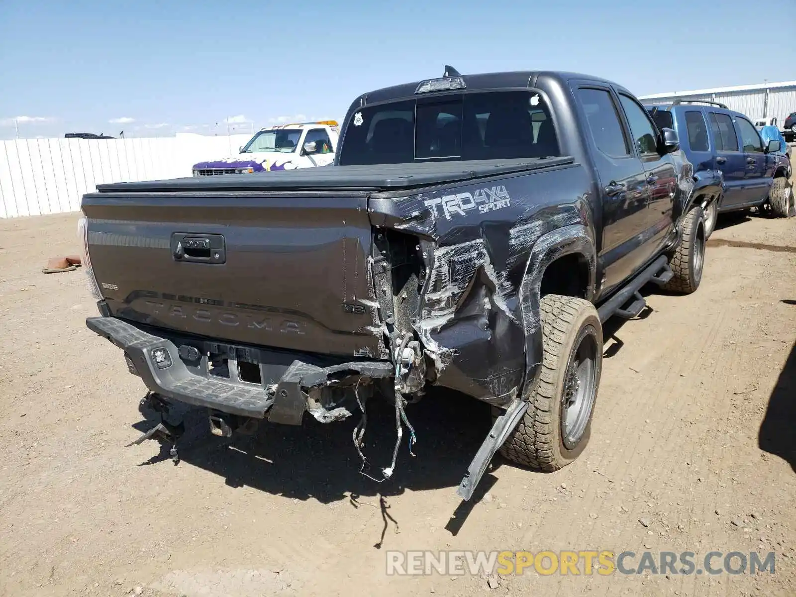 4 Photograph of a damaged car 3TMCZ5AN4KM270987 TOYOTA TACOMA 2019