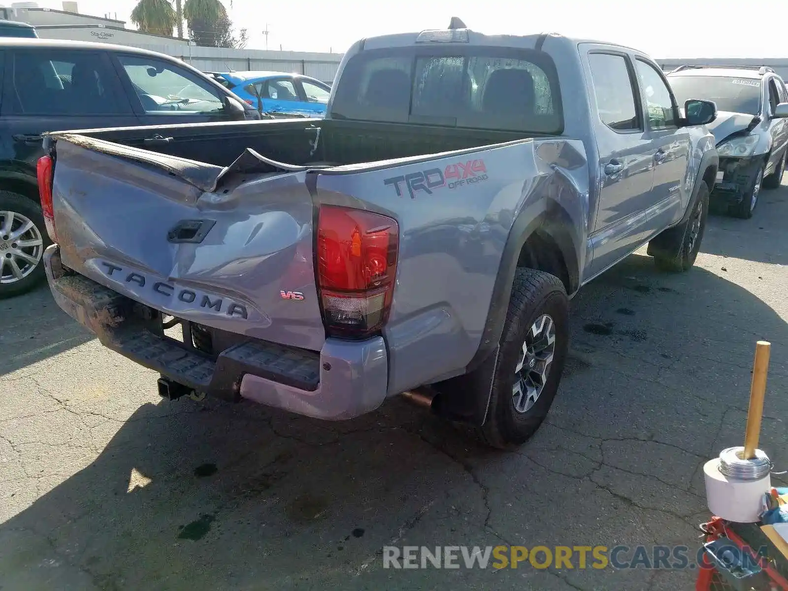 4 Photograph of a damaged car 3TMCZ5AN4KM272271 TOYOTA TACOMA 2019