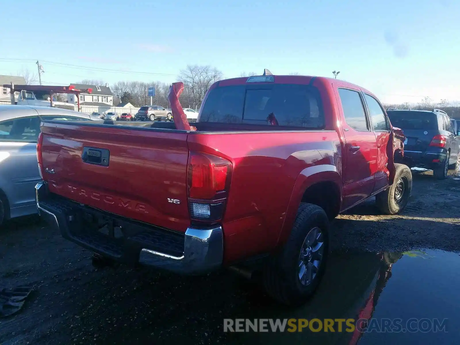 4 Photograph of a damaged car 3TMCZ5AN4KM276613 TOYOTA TACOMA 2019