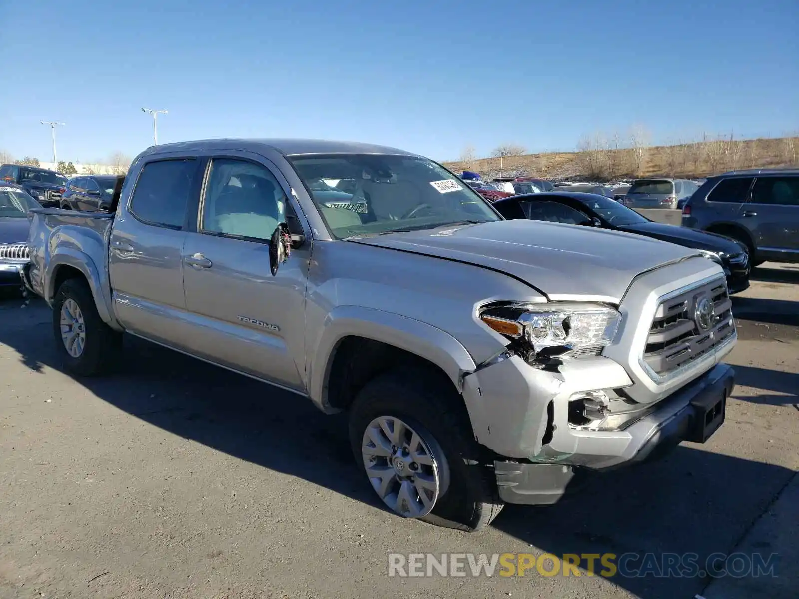 1 Photograph of a damaged car 3TMCZ5AN4KM283724 TOYOTA TACOMA 2019