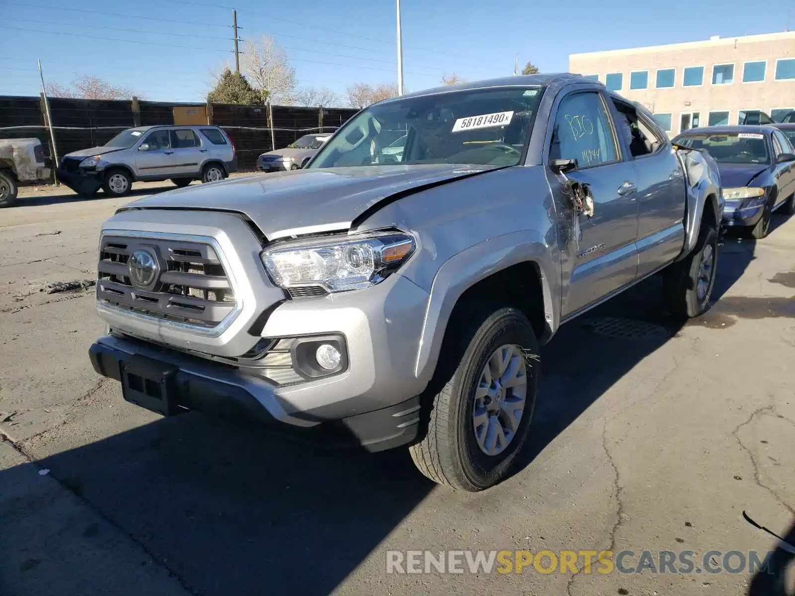 2 Photograph of a damaged car 3TMCZ5AN4KM283724 TOYOTA TACOMA 2019