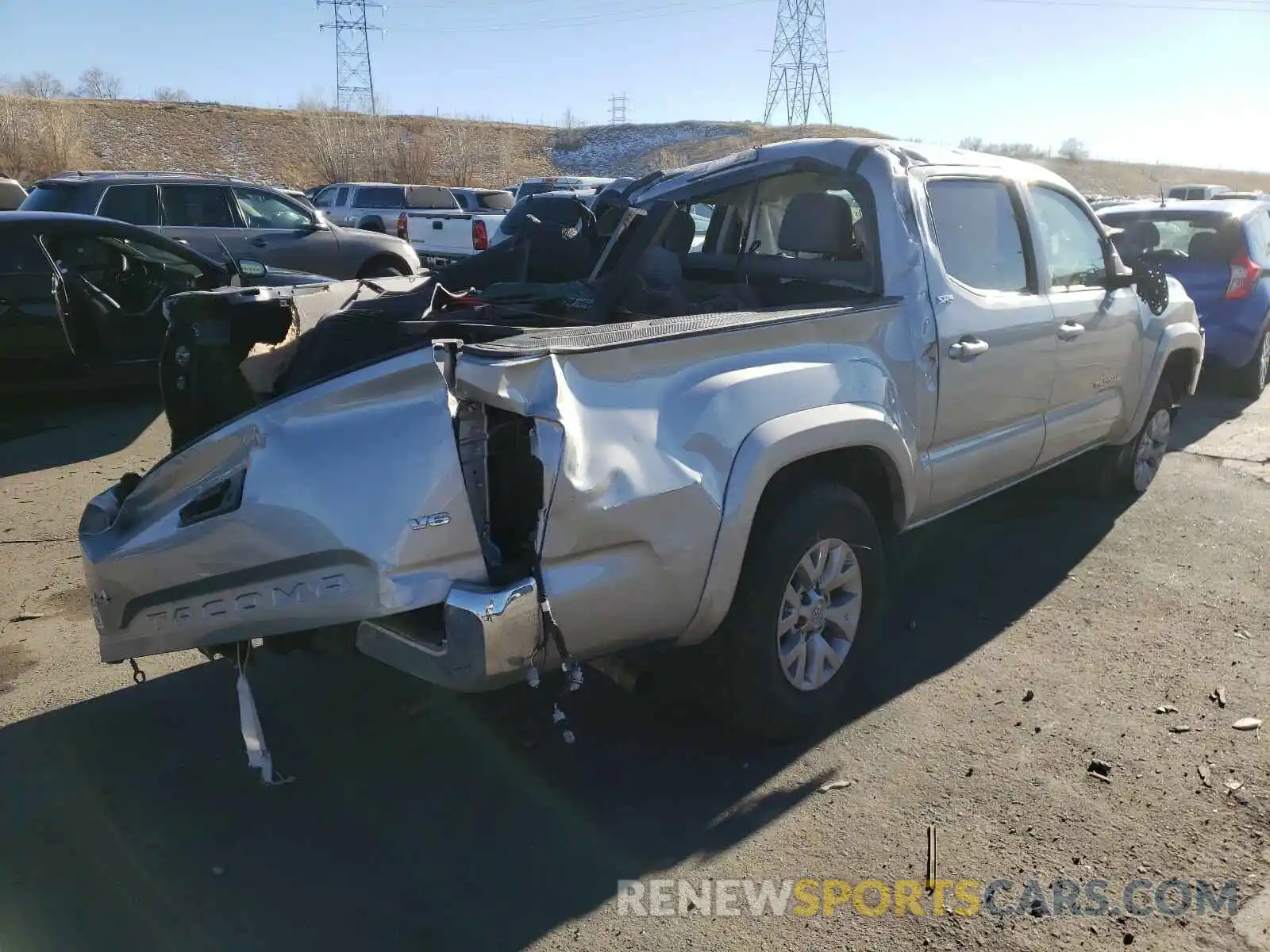 4 Photograph of a damaged car 3TMCZ5AN4KM283724 TOYOTA TACOMA 2019