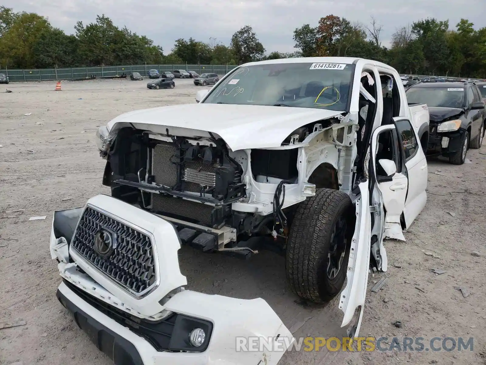 2 Photograph of a damaged car 3TMCZ5AN4KM285389 TOYOTA TACOMA 2019