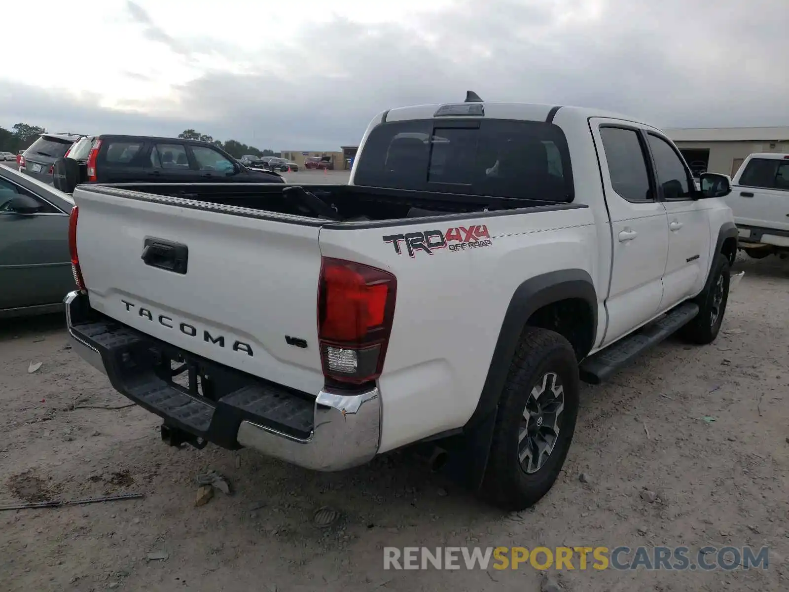 4 Photograph of a damaged car 3TMCZ5AN4KM285389 TOYOTA TACOMA 2019