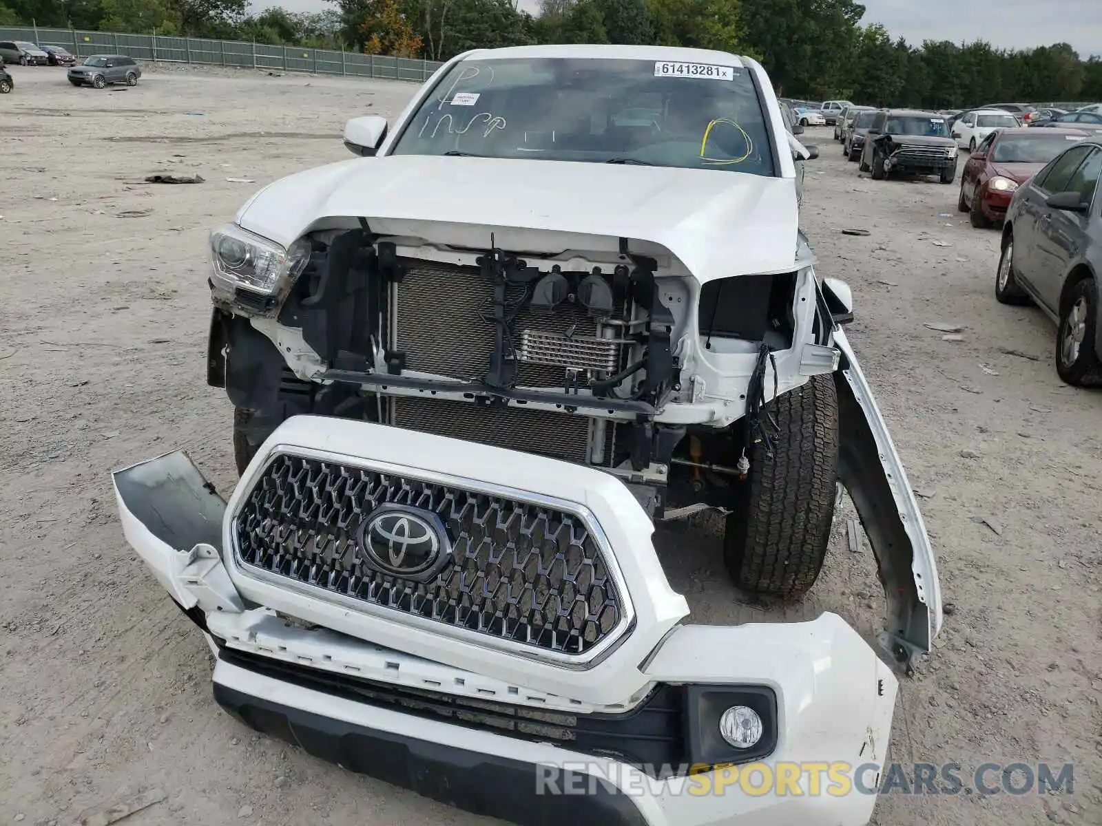 9 Photograph of a damaged car 3TMCZ5AN4KM285389 TOYOTA TACOMA 2019