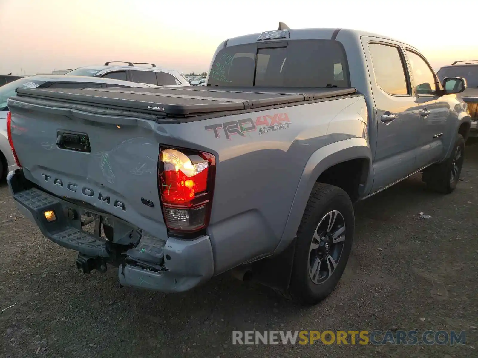 4 Photograph of a damaged car 3TMCZ5AN4KM287904 TOYOTA TACOMA 2019