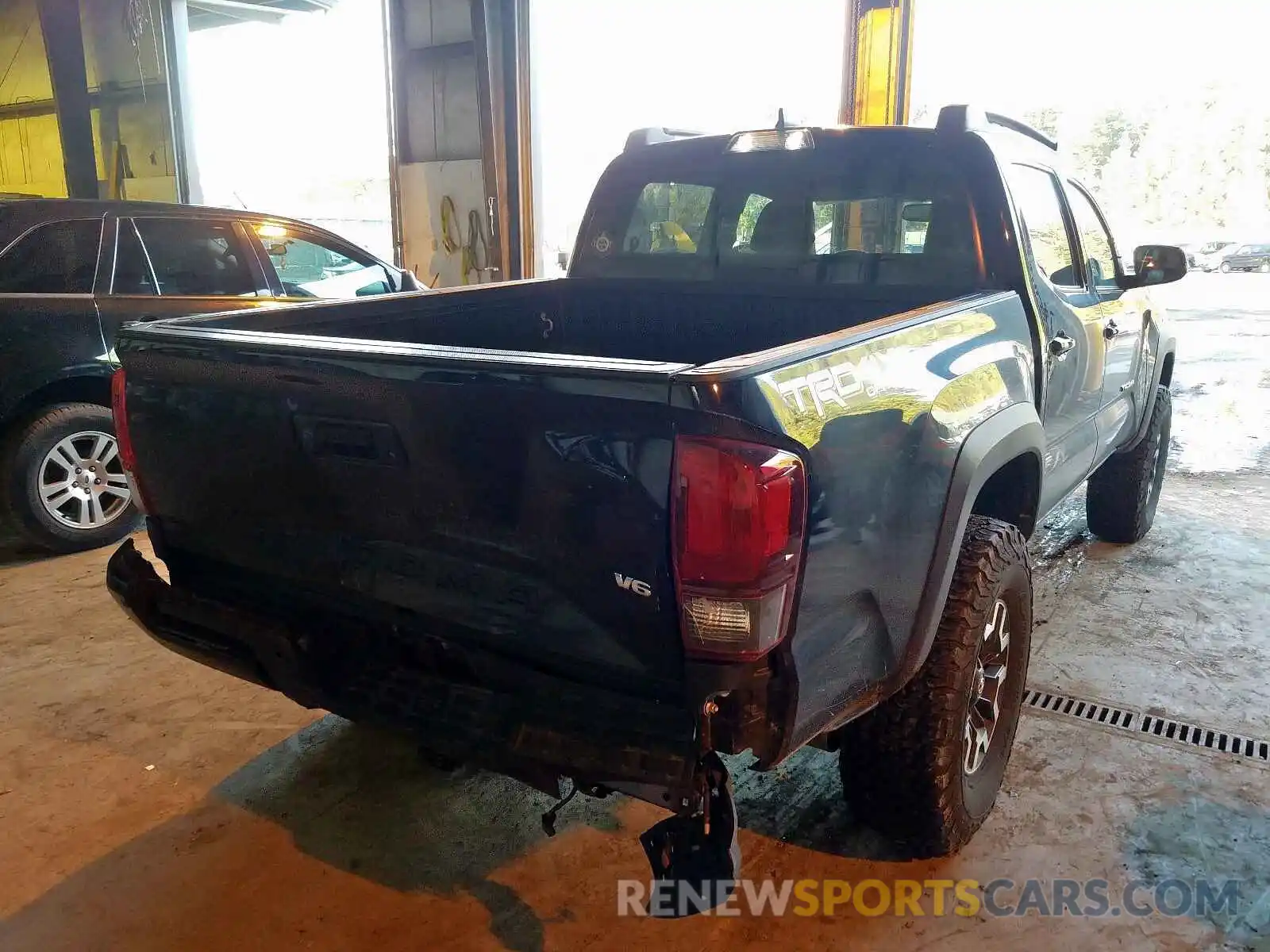 4 Photograph of a damaged car 3TMCZ5AN5KM189030 TOYOTA TACOMA 2019