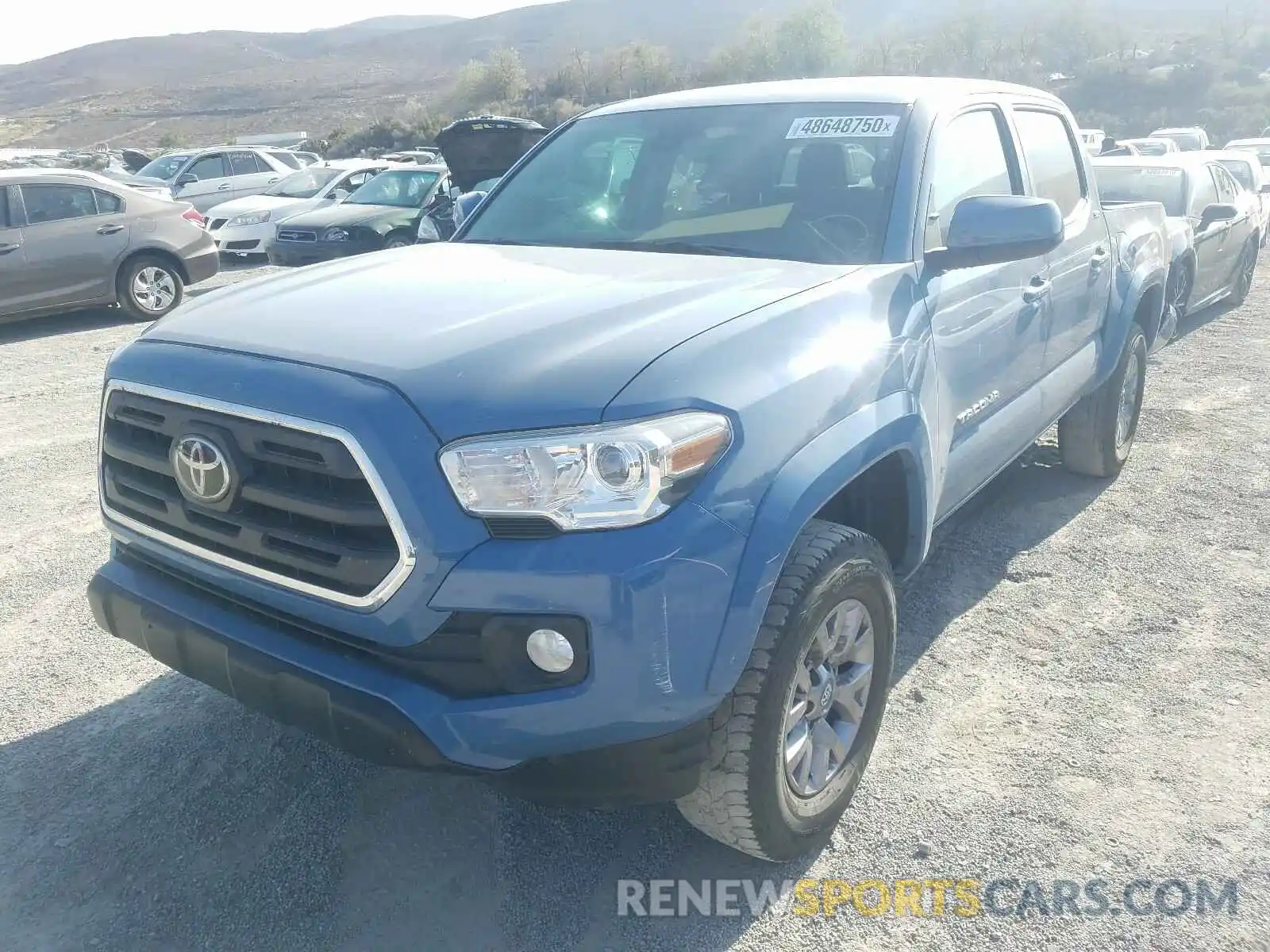 2 Photograph of a damaged car 3TMCZ5AN5KM192719 TOYOTA TACOMA 2019