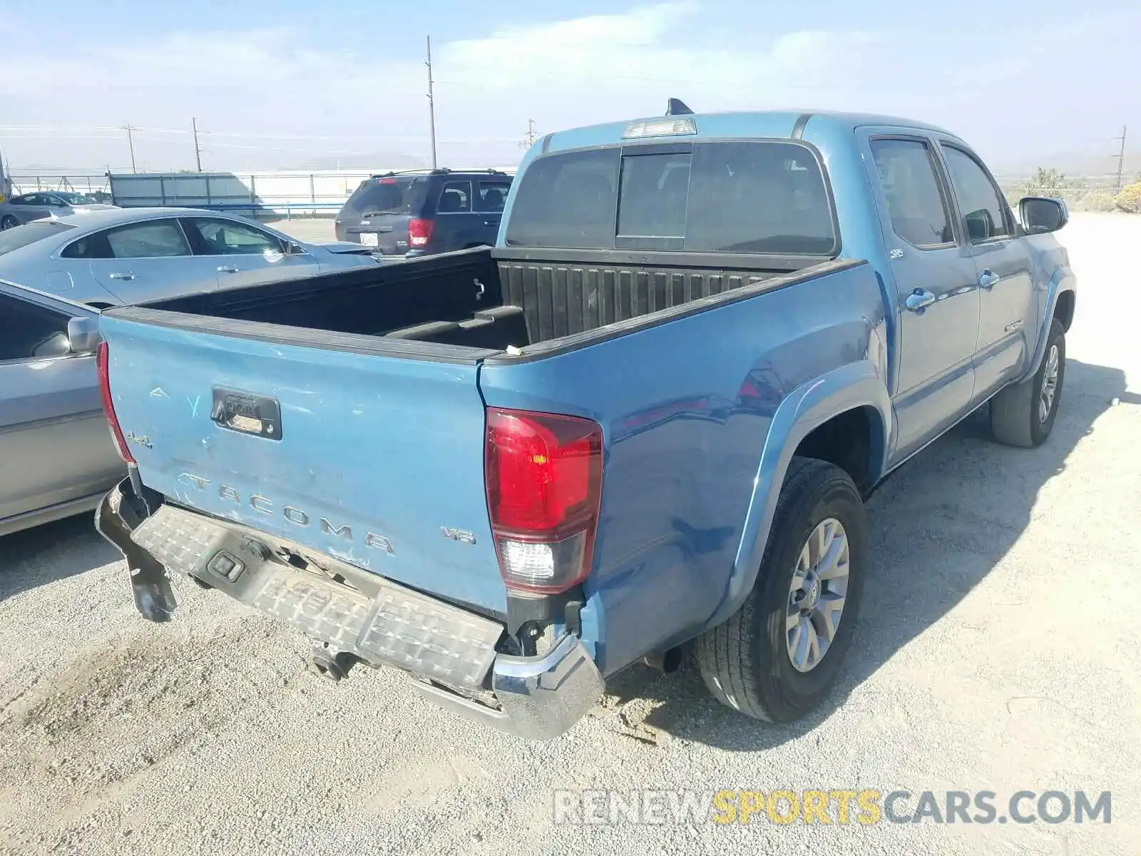 4 Photograph of a damaged car 3TMCZ5AN5KM192719 TOYOTA TACOMA 2019