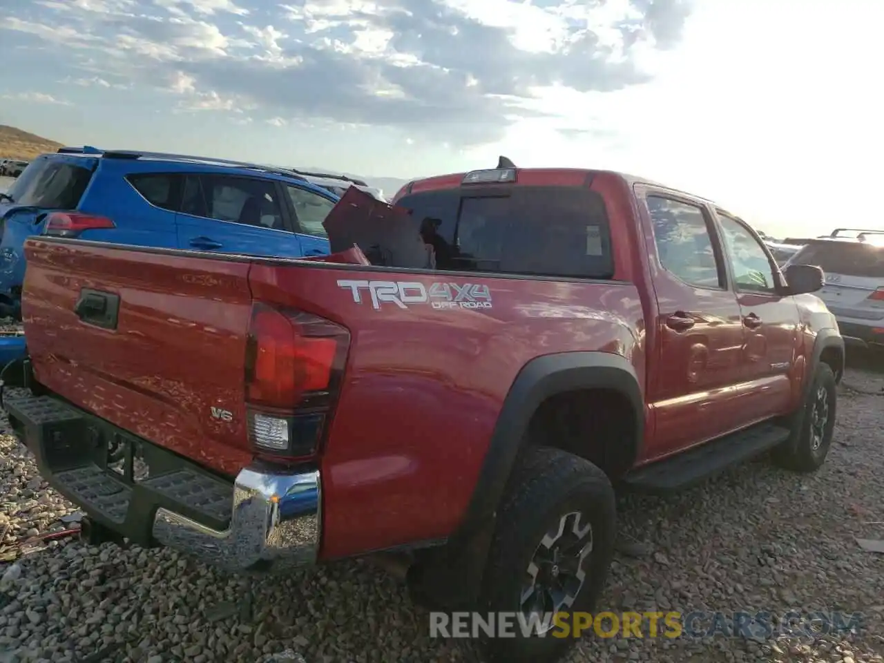 4 Photograph of a damaged car 3TMCZ5AN5KM194535 TOYOTA TACOMA 2019