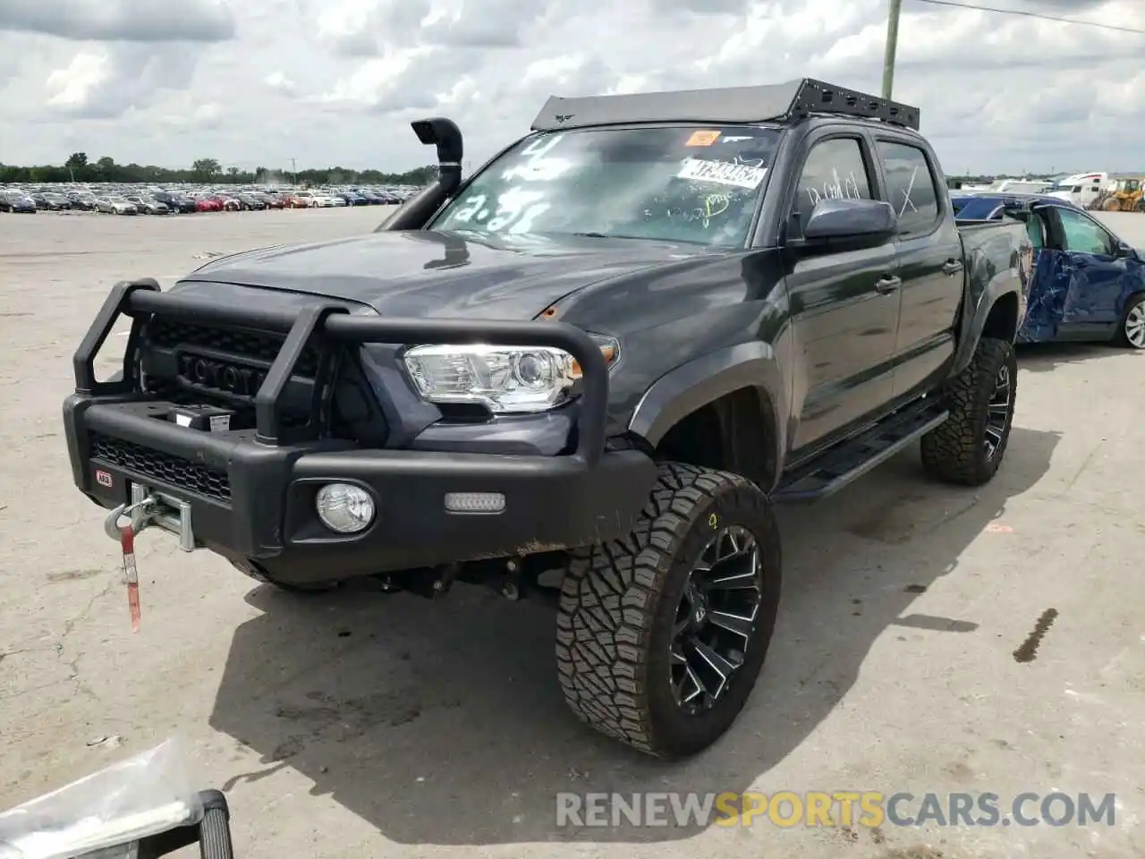 2 Photograph of a damaged car 3TMCZ5AN5KM194924 TOYOTA TACOMA 2019