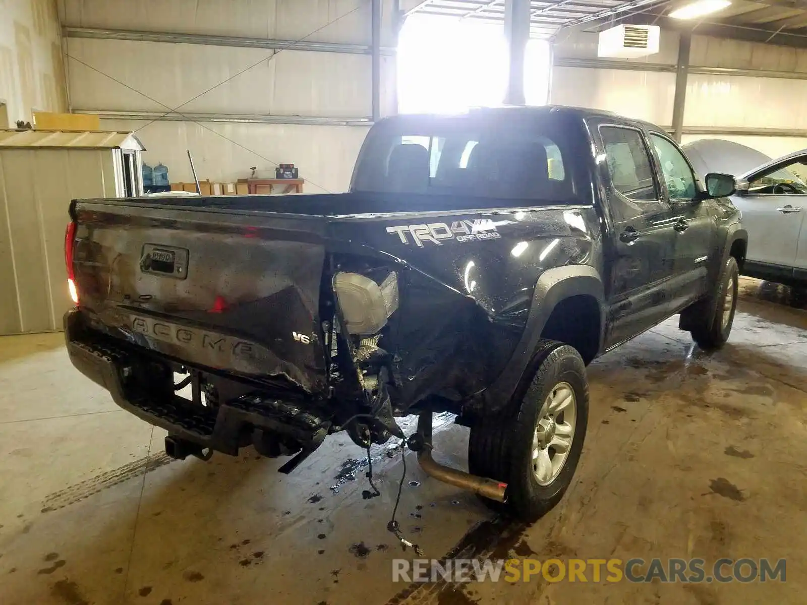 4 Photograph of a damaged car 3TMCZ5AN5KM198388 TOYOTA TACOMA 2019