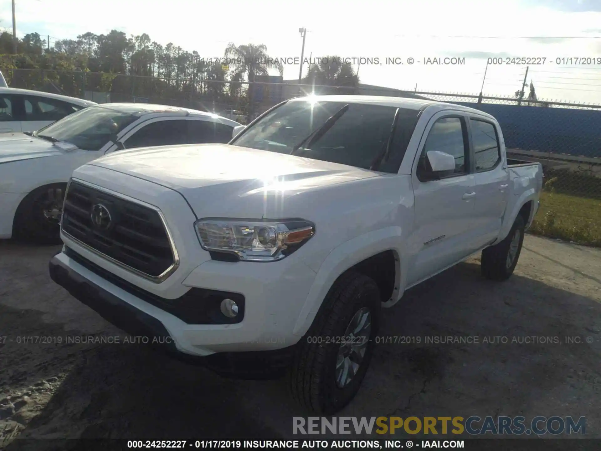 2 Photograph of a damaged car 3TMCZ5AN5KM198763 TOYOTA TACOMA 2019