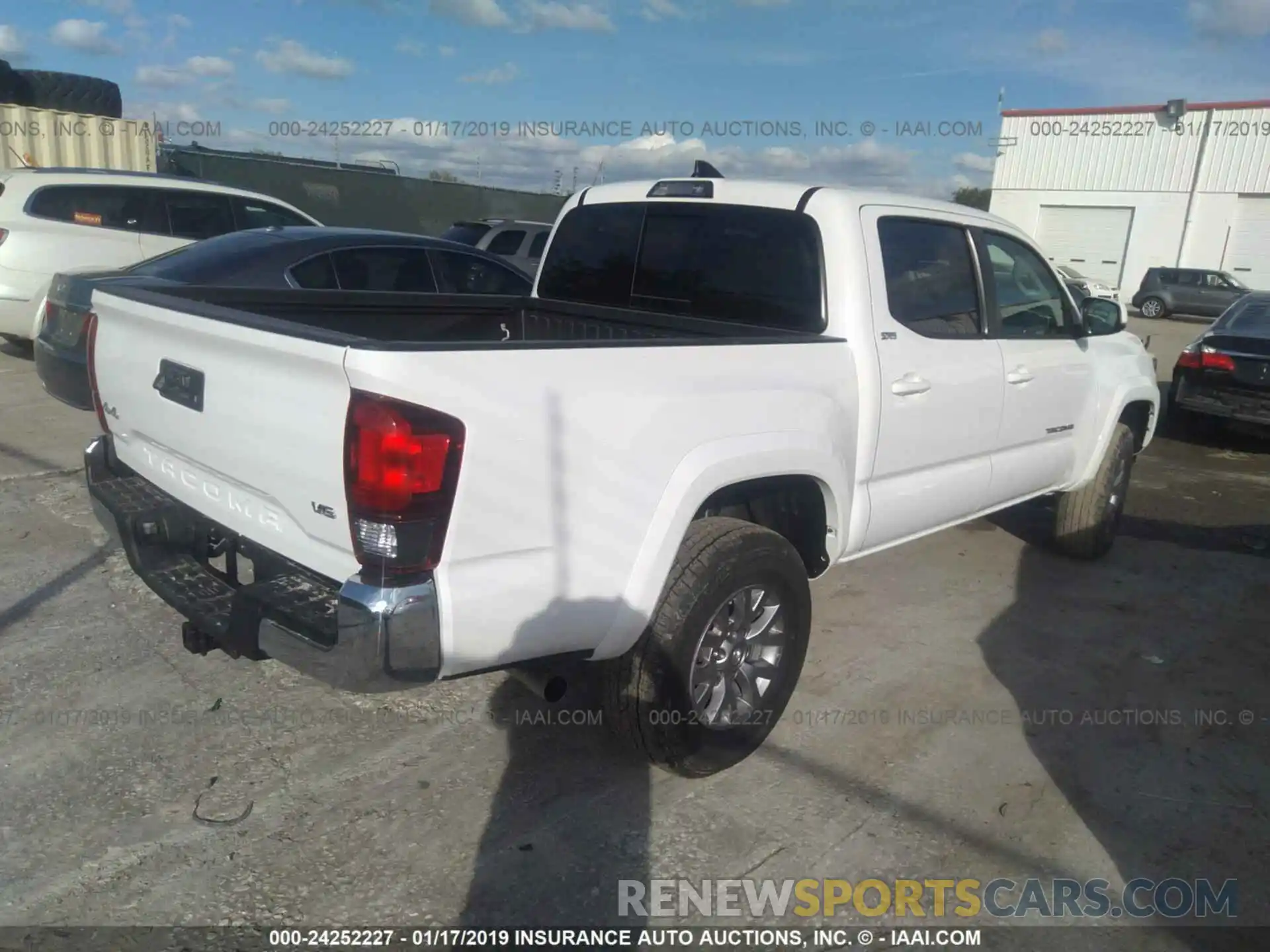 4 Photograph of a damaged car 3TMCZ5AN5KM198763 TOYOTA TACOMA 2019