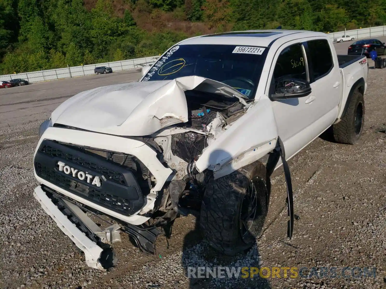 2 Photograph of a damaged car 3TMCZ5AN5KM203265 TOYOTA TACOMA 2019