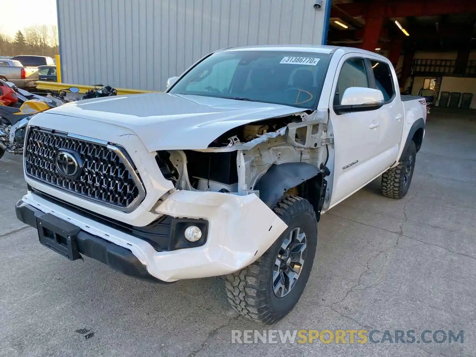 2 Photograph of a damaged car 3TMCZ5AN5KM208823 TOYOTA TACOMA 2019