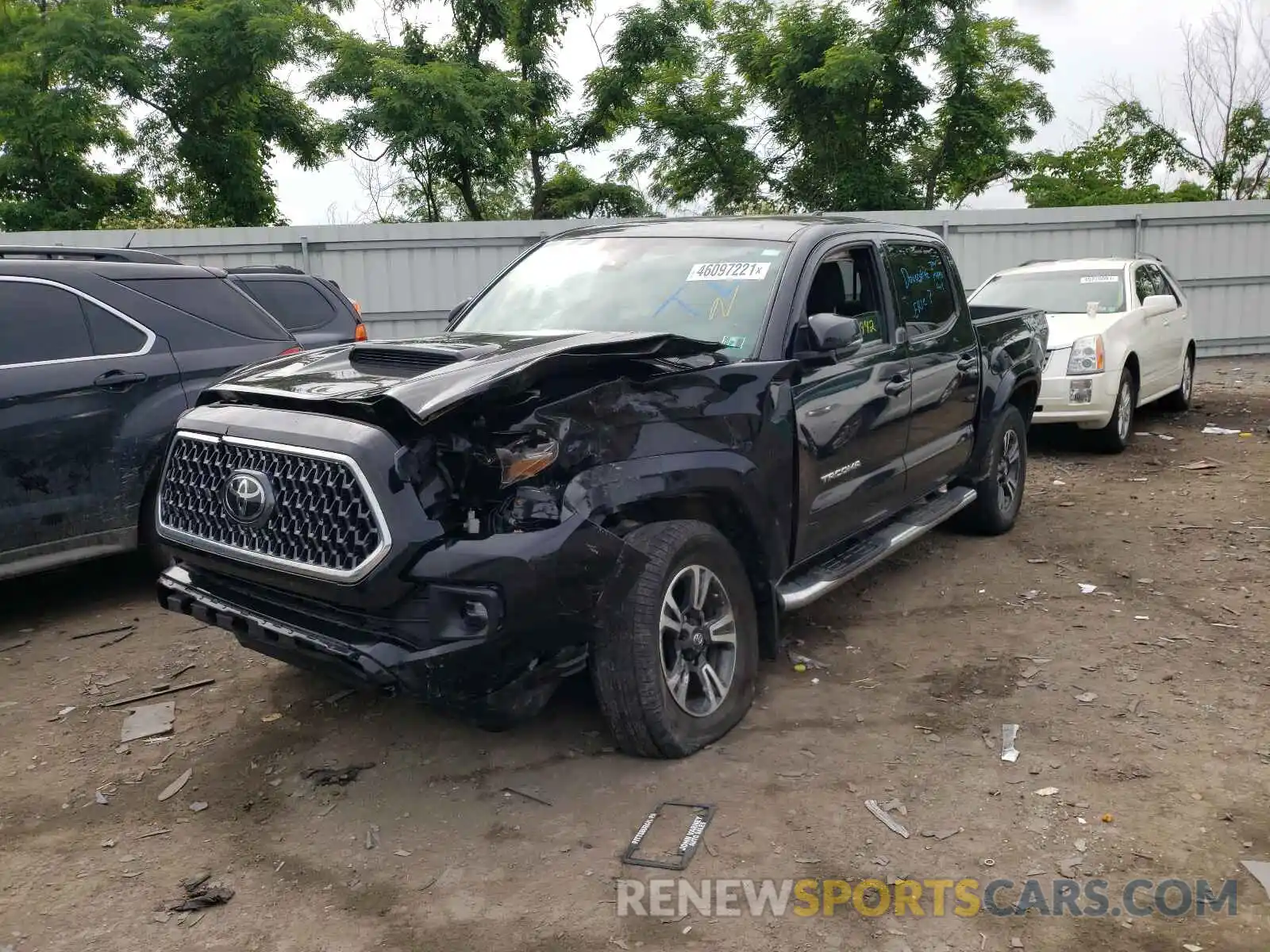 2 Photograph of a damaged car 3TMCZ5AN5KM209745 TOYOTA TACOMA 2019