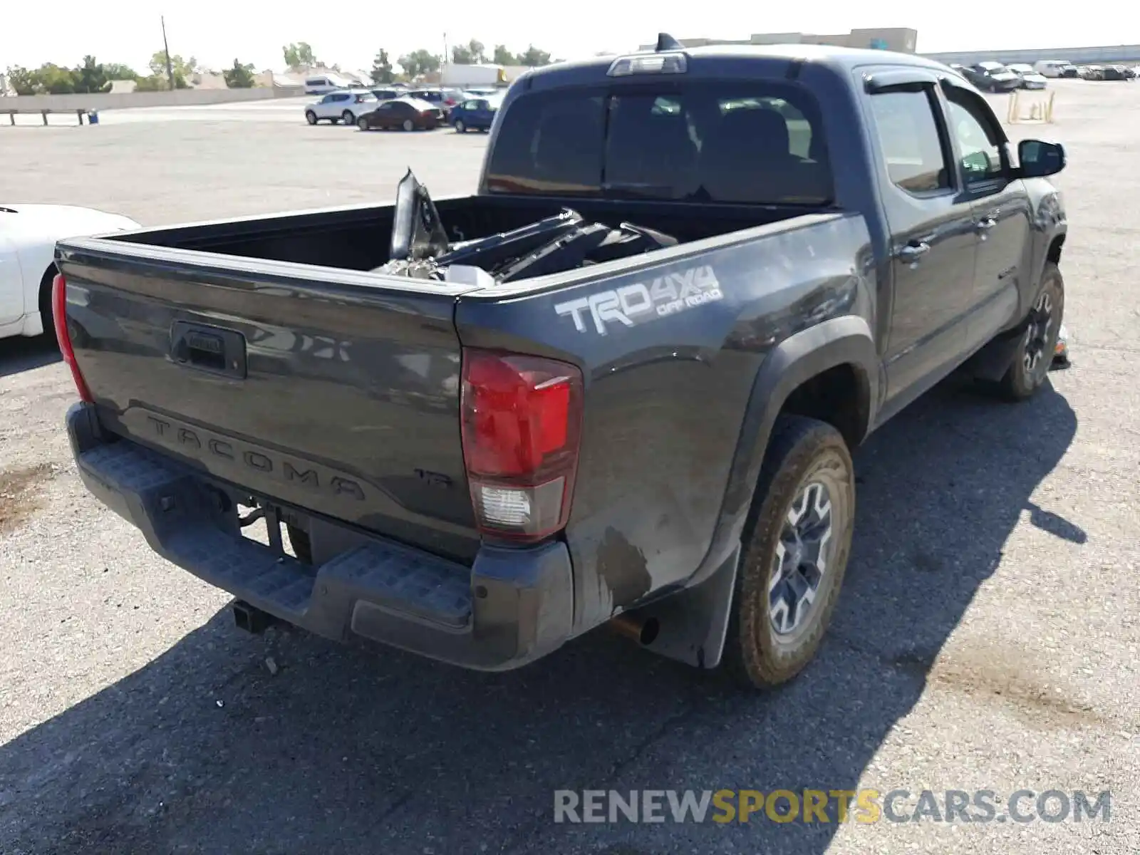 4 Photograph of a damaged car 3TMCZ5AN5KM213777 TOYOTA TACOMA 2019