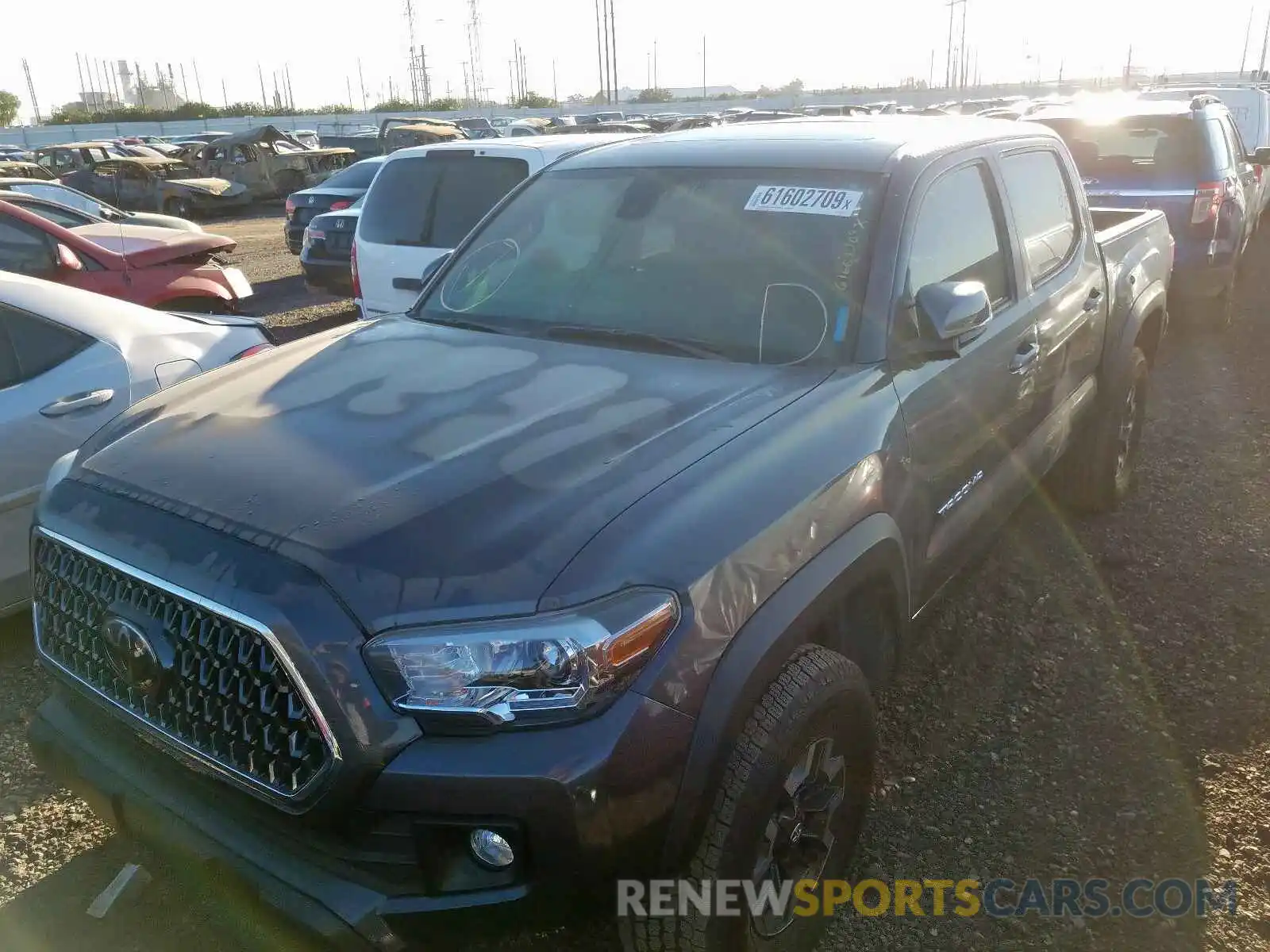 2 Photograph of a damaged car 3TMCZ5AN5KM214279 TOYOTA TACOMA 2019