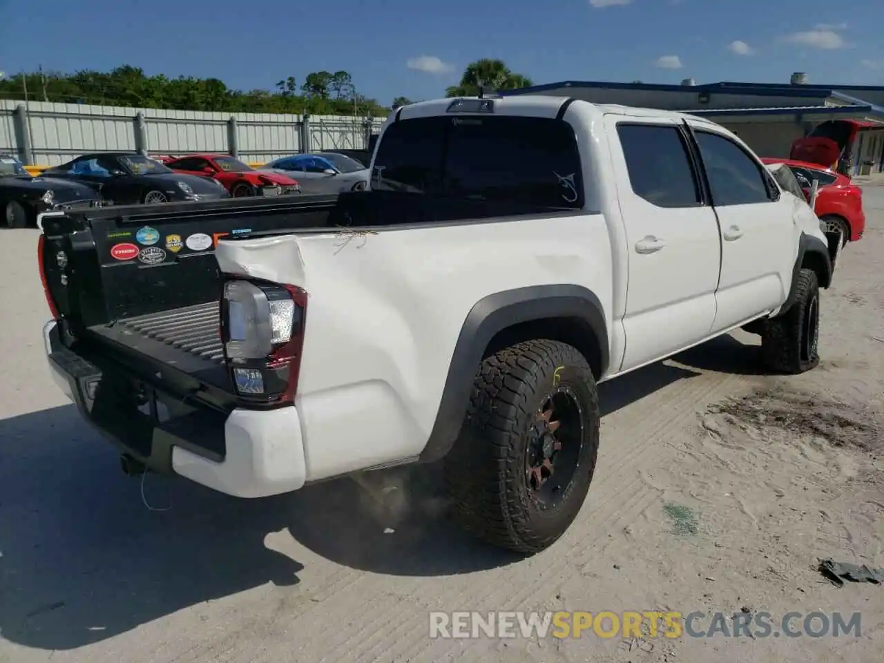 4 Photograph of a damaged car 3TMCZ5AN5KM216744 TOYOTA TACOMA 2019