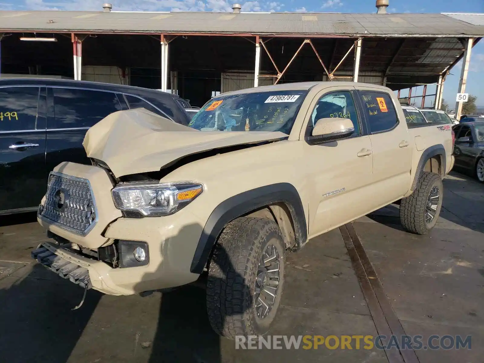 2 Photograph of a damaged car 3TMCZ5AN5KM217893 TOYOTA TACOMA 2019