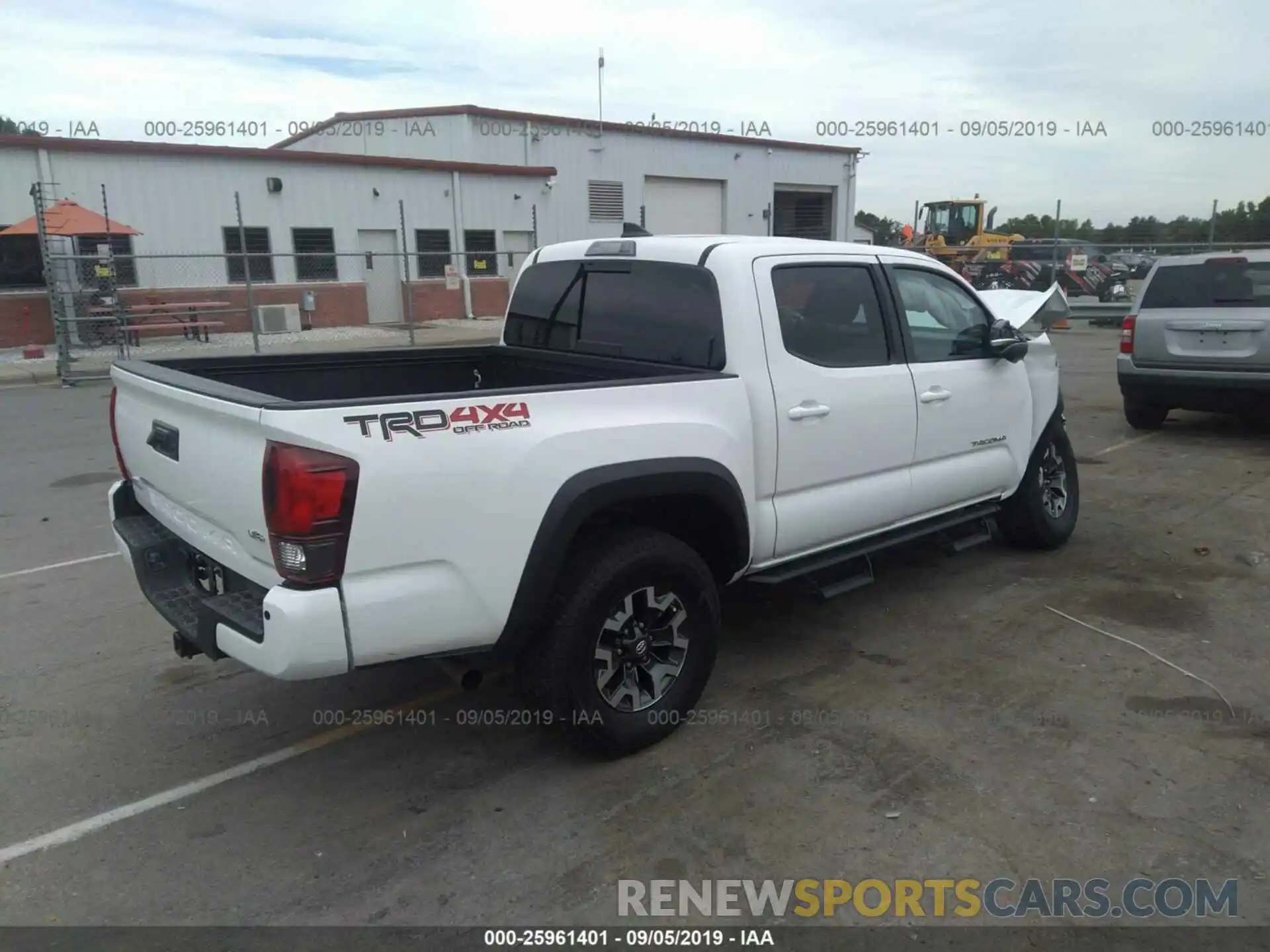 4 Photograph of a damaged car 3TMCZ5AN5KM220972 TOYOTA TACOMA 2019