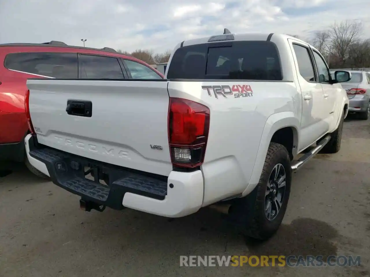 4 Photograph of a damaged car 3TMCZ5AN5KM221314 TOYOTA TACOMA 2019