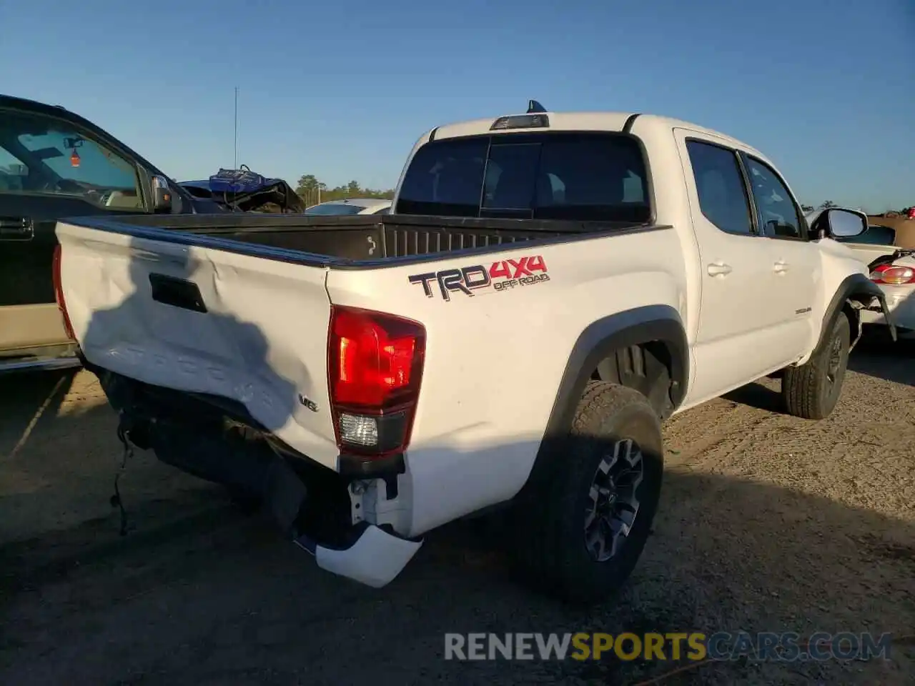 4 Photograph of a damaged car 3TMCZ5AN5KM222494 TOYOTA TACOMA 2019