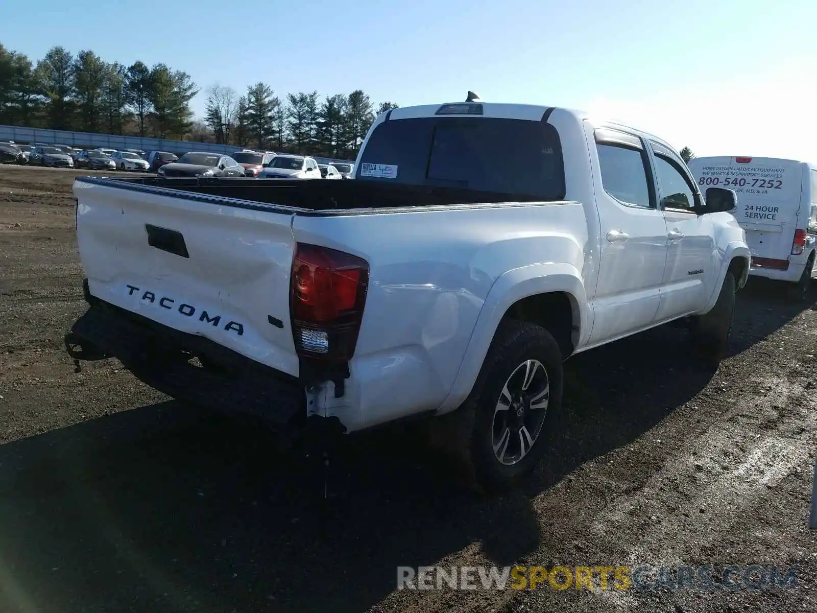 4 Photograph of a damaged car 3TMCZ5AN5KM230949 TOYOTA TACOMA 2019