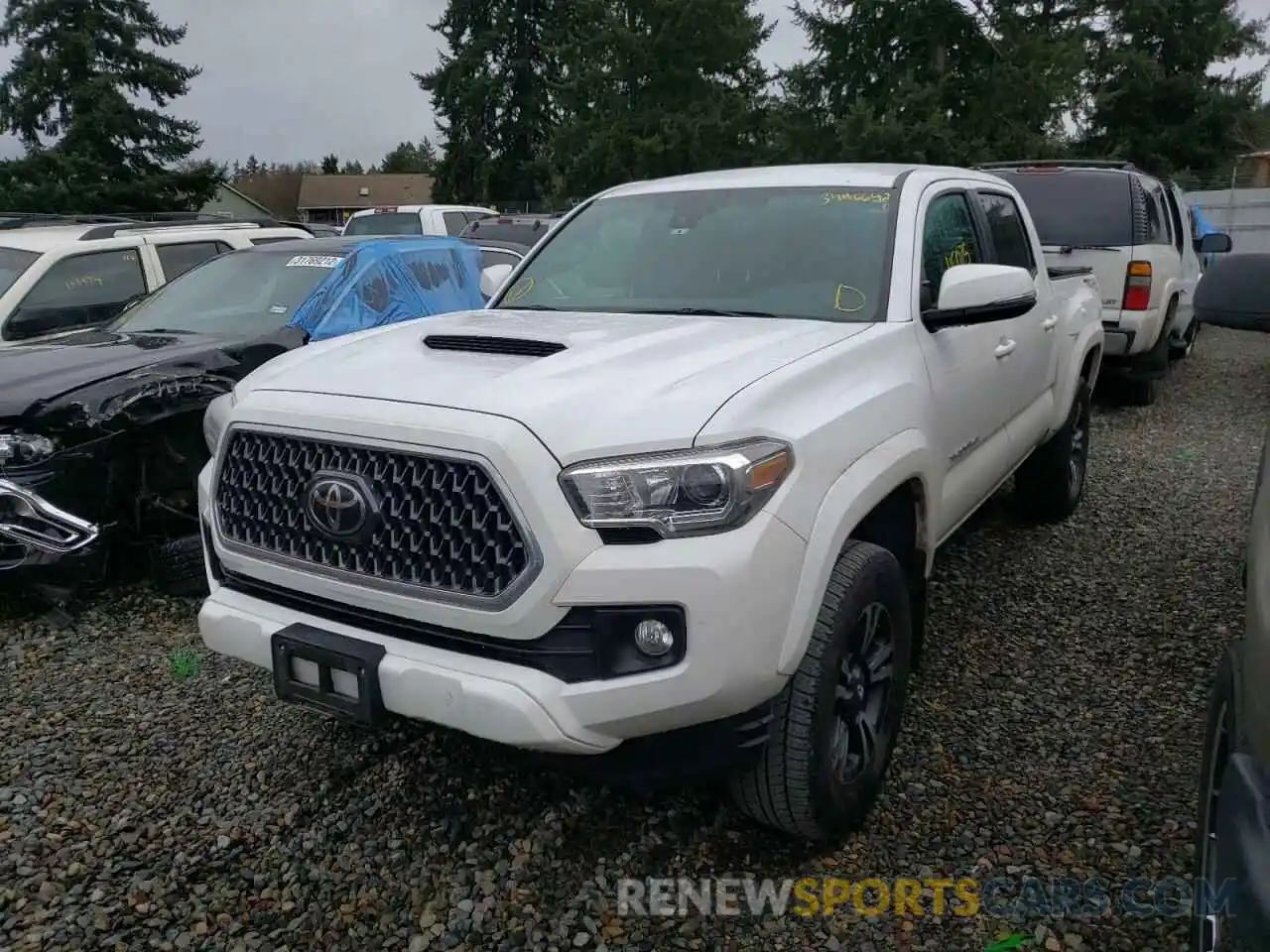 2 Photograph of a damaged car 3TMCZ5AN5KM232619 TOYOTA TACOMA 2019